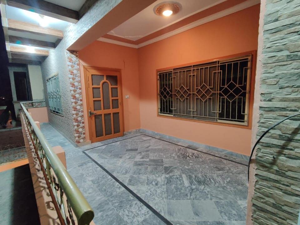Malik Lodges Apartment in Islamabad