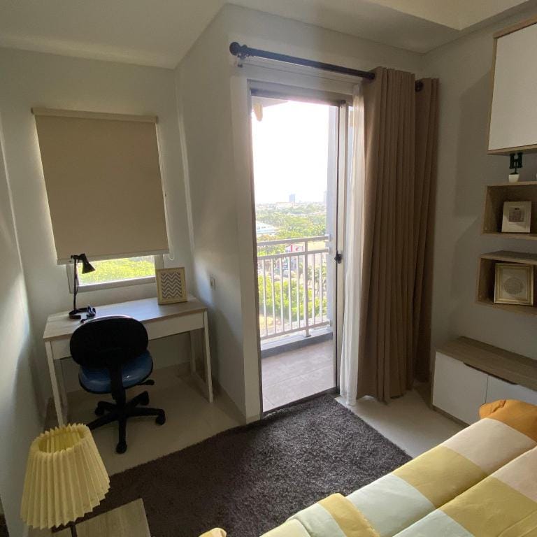 Tentrem Room at Springwood Alam Sutera Apartment in West Java