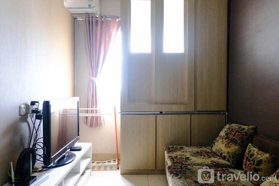Simply Homey 2BR at 11 Floor Pinewood By Travelio Apartment in West Java