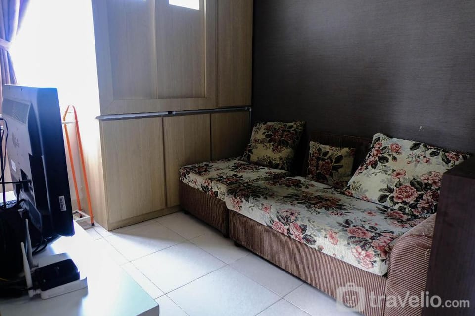 Simply Homey 2BR at 11 Floor Pinewood By Travelio Apartment in West Java