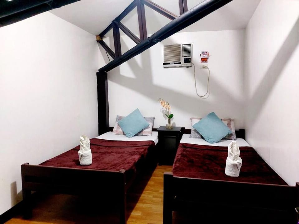 Amancio's Balai Prime Location Room w/Shared Bath Apartment in Puerto Princesa