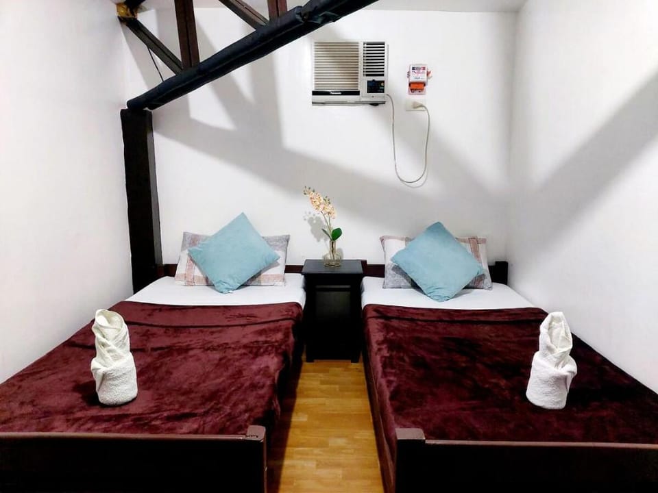 Amancio's Balai Prime Location Room w/Shared Bath Apartment in Puerto Princesa