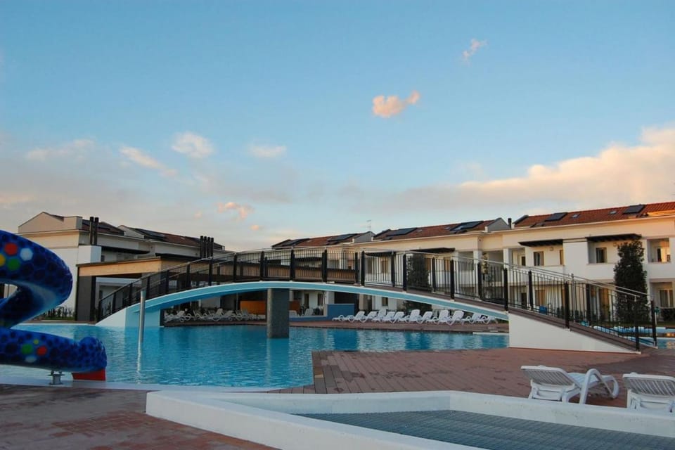 Lovely flat wiht enclosed garden and fireplace Apartment in Bibione