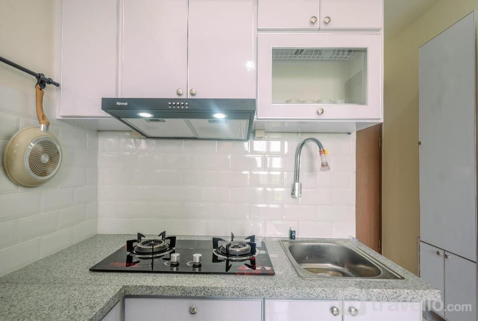 Fully Furnished 2BR Podomoro Golf View By Travelio Apartment in West Java