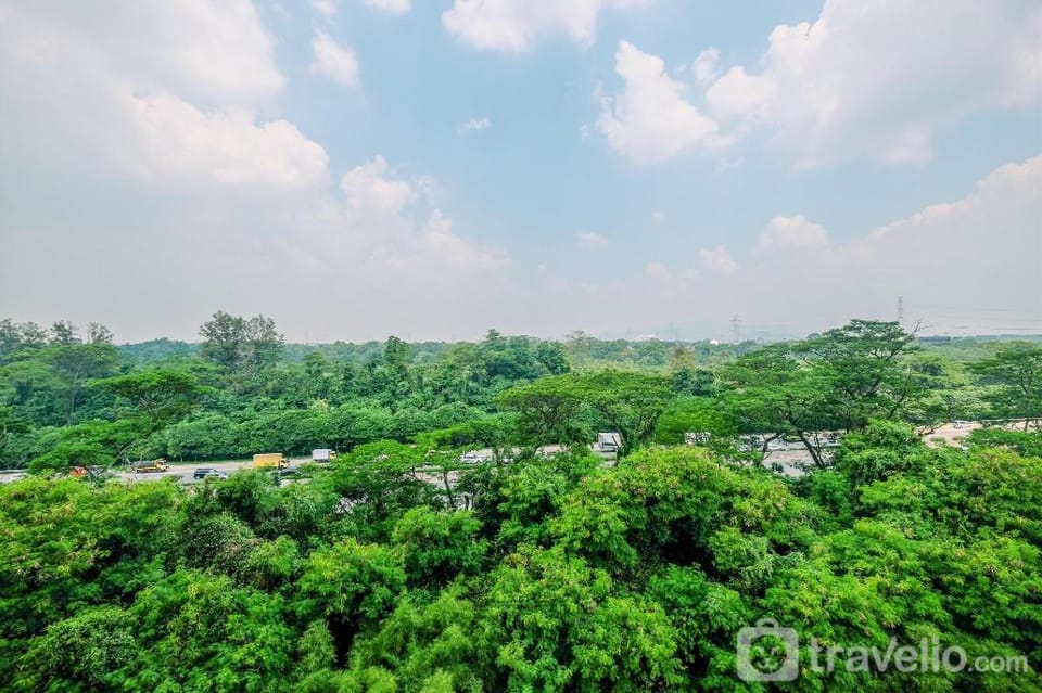 Fully Furnished 2BR Podomoro Golf View By Travelio Apartment in West Java