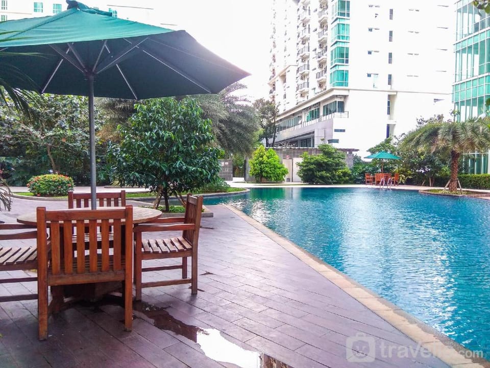 Comfy and Minimalist 1BR Woodland Park By Travelio Apartment in South Jakarta City