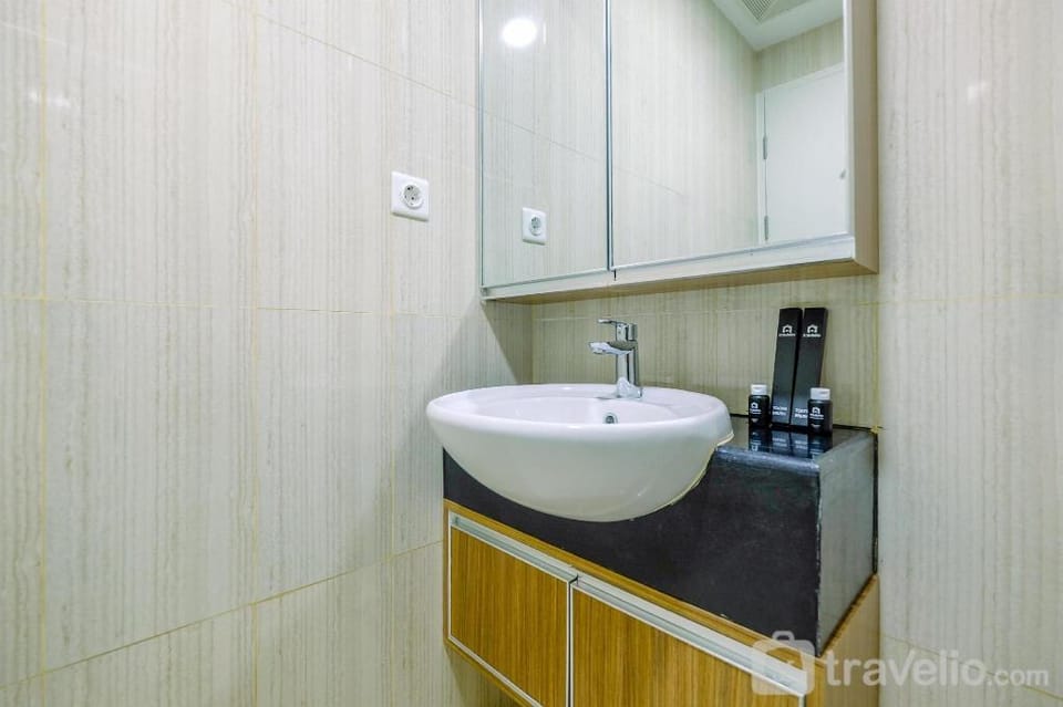 Enjoy Living 2BR at Sentul Tower By Travelio Apartment in West Java