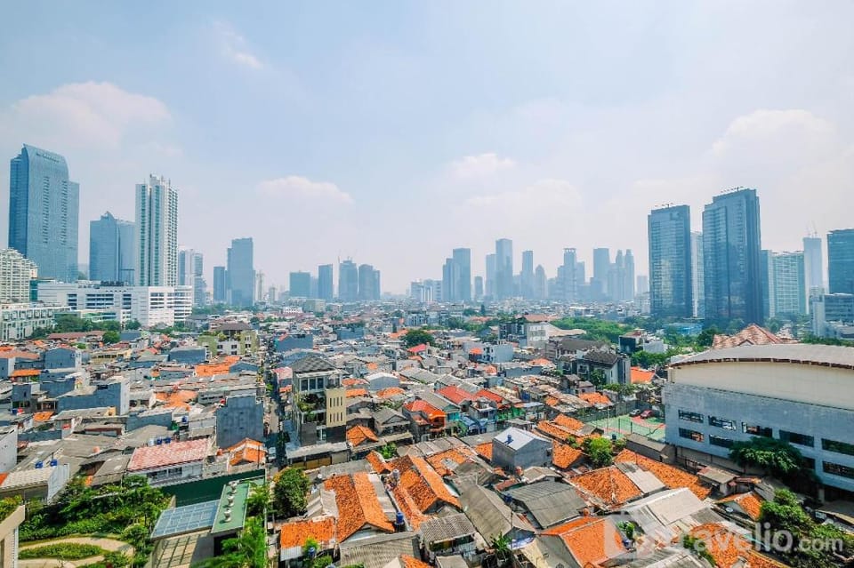 Homey Warm 1BR at Ambassade Residence By Travelio Apartment in South Jakarta City