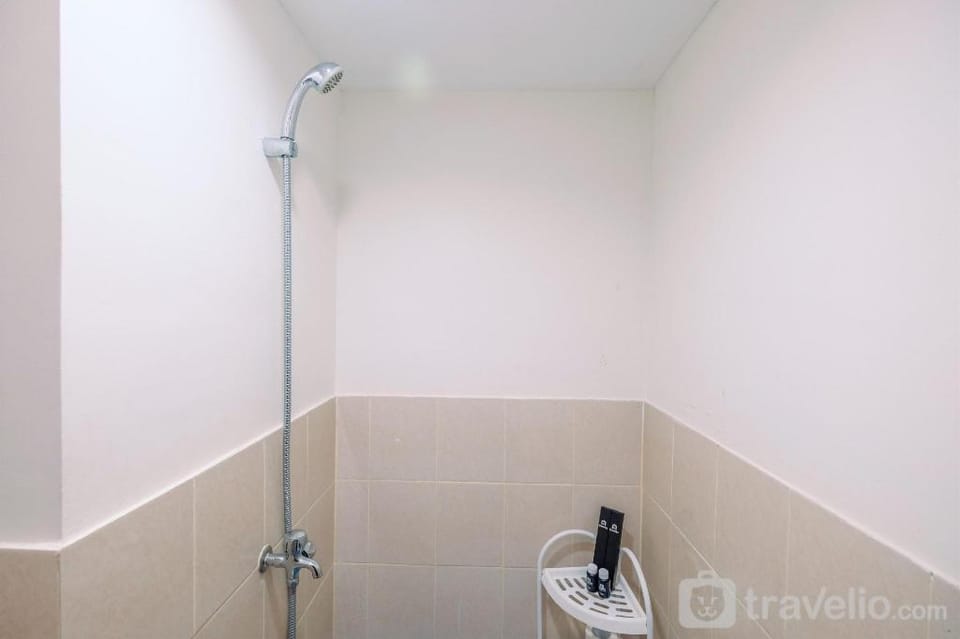 Comfy Tidy 1BR at Podomoro Golf View By Travelio Apartment in West Java