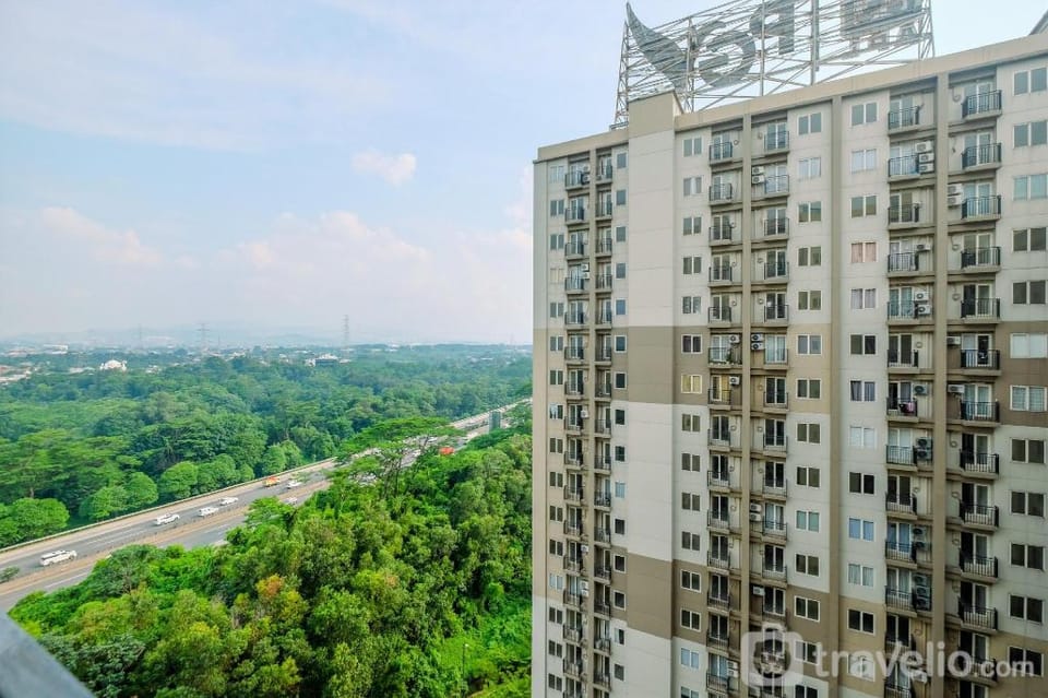 Comfy Tidy 1BR at Podomoro Golf View By Travelio Apartment in West Java