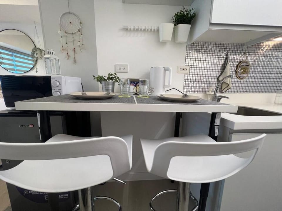 Light and Airy Staycation Studio in Azure North Apartment in Calabarzon
