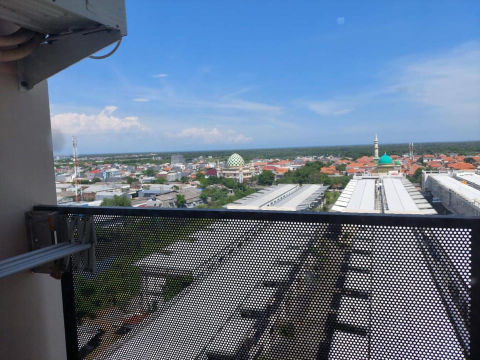 White Studio Group Surabaya - Studio821 at Amega Apartment in Surabaya