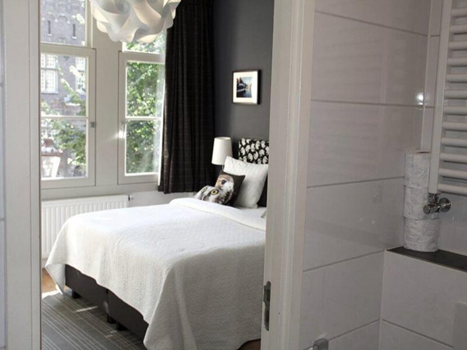 Canal and Rear room center of Amsterdam Apartment in Amsterdam