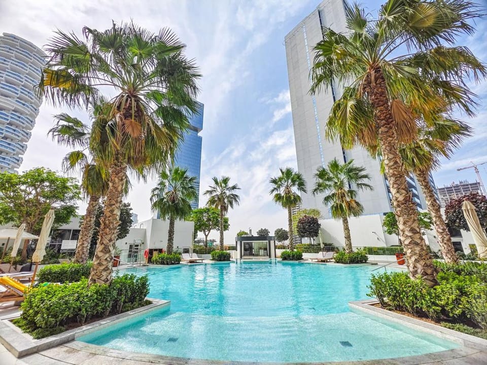 Luxury Studio with Pool View in Vibrant Community Apartment in Dubai