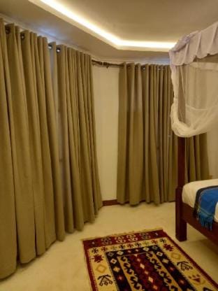 Cheerful 4 bedroom beach front villa with pool Villa in Diani Beach