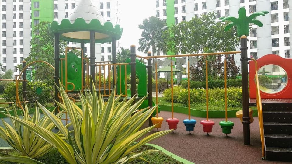 Pelangi Rooms At Apartemen Green Lake View By FPH Apartment in South Jakarta City