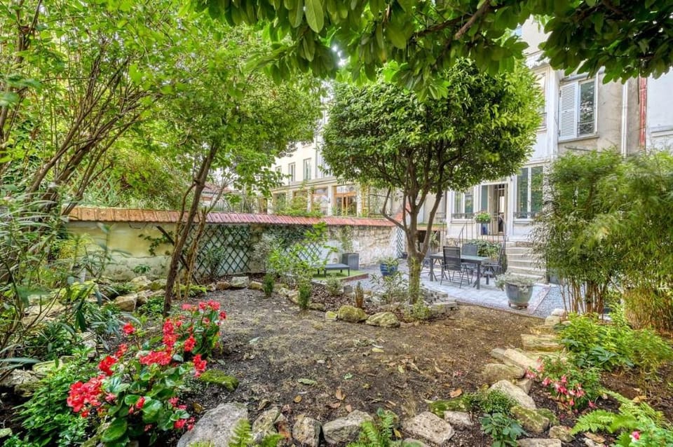 Maison 70m² avec jardin de 90m² au centre de Paris Apartment in Paris