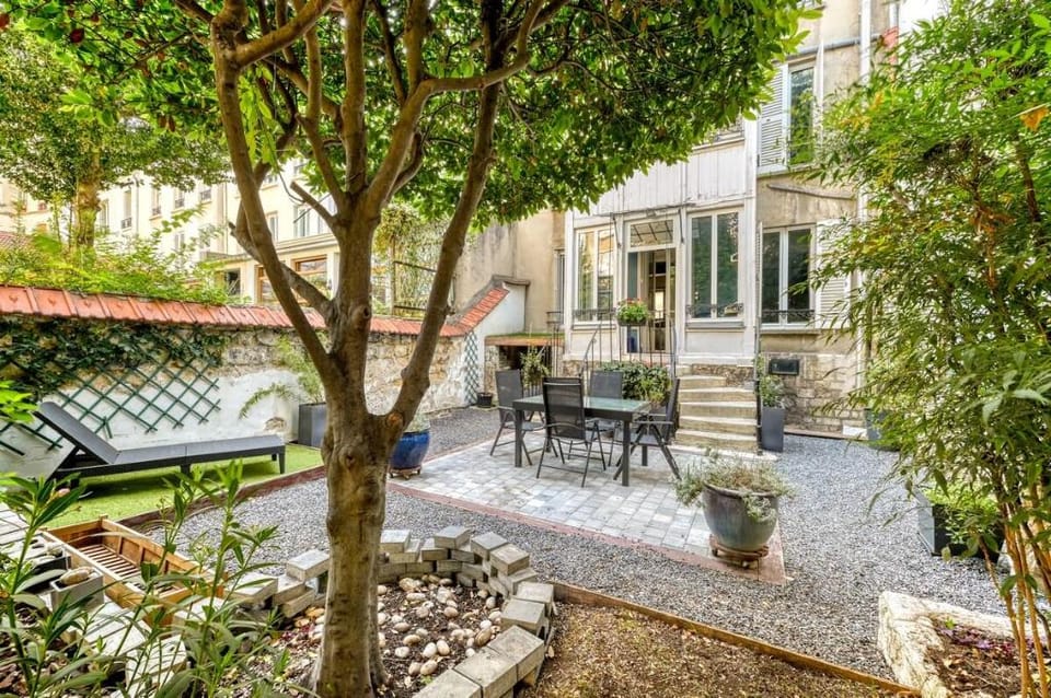 Maison 70m² avec jardin de 90m² au centre de Paris Apartment in Paris