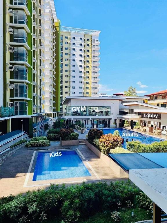 Staycation near malls w/ 2 beds+Unli Wifi+Netflix Apartment in Cagayan de Oro