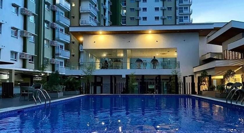 Staycation near malls w/ 2 beds+Unli Wifi+Netflix Apartment in Cagayan de Oro