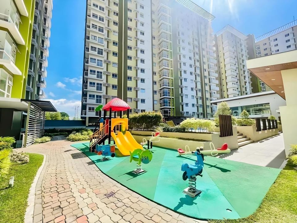 Staycation near malls w/ 2 beds+Unli Wifi+Netflix Apartment in Cagayan de Oro