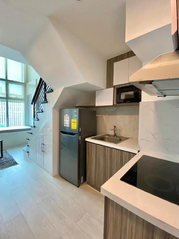 Modern Loft with Workspace in Ortigas CBD Apartment in Pasig