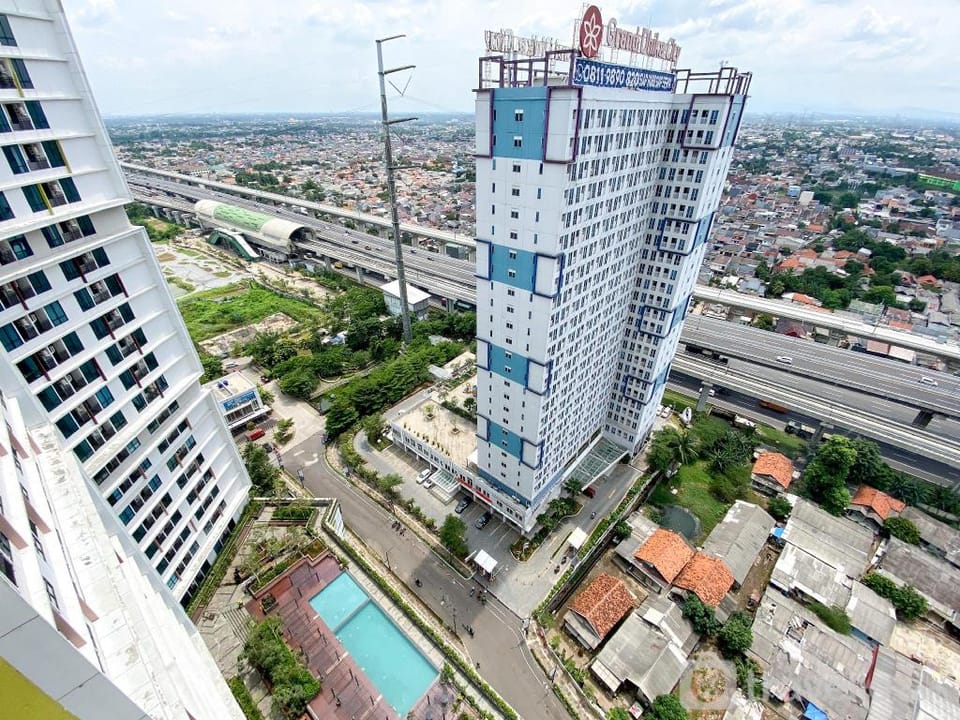 White Toned Studio LRT City Bekasi Apt By Travelio Apartment in West Java