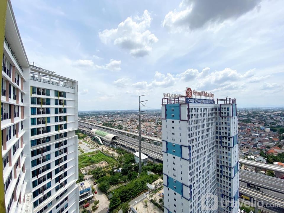 White Toned Studio LRT City Bekasi Apt By Travelio Apartment in West Java