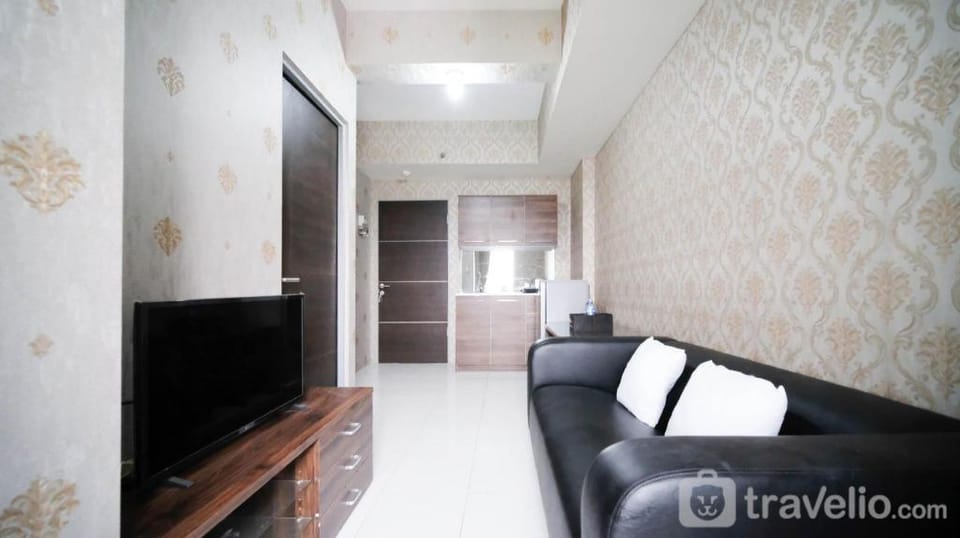 Tidy Comfy 1BR at Tamansari Prospero By Travelio Apartment in East Java