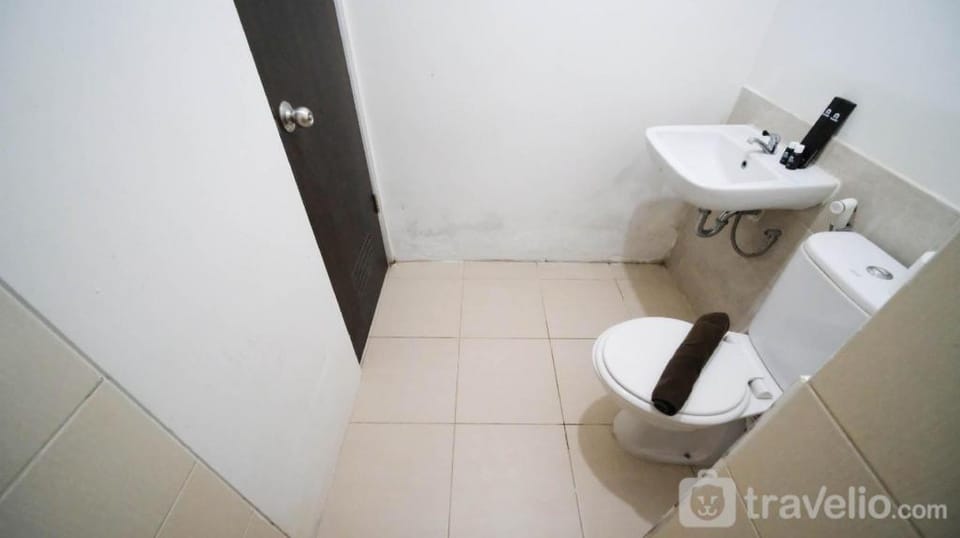 Tidy Comfy 1BR at Tamansari Prospero By Travelio Apartment in East Java