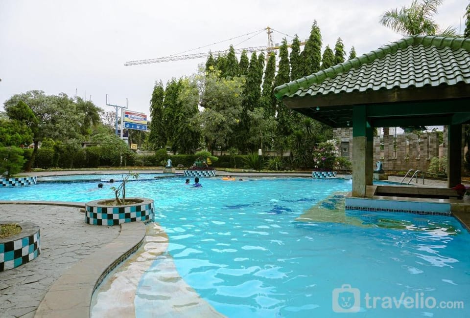 Cozy and Simply Look 2BR Puri Garden By Travelio Apartment in Jakarta