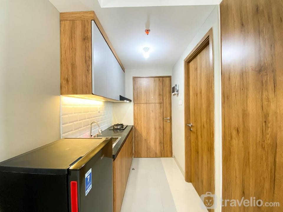 Homey Cozy Studio LRT City Jatibening By Travelio Apartment in Jakarta