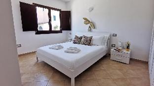 Welcomely - La Terrazza sul Faro Apartment in Sardinia