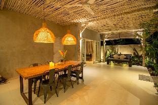 Canggu Tropical Villa with Industrial Flair  Villa in North Kuta