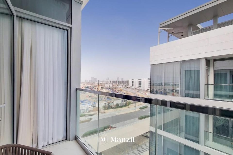 Stylish 1 BR at district one w/ Burj Khalifa View Apartment in Dubai
