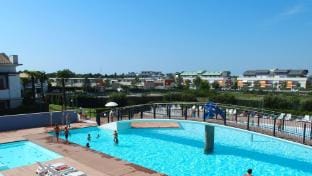 Apartment with swimming pool and garden in a tourist village no560 Apartment in Bibione