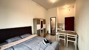 RoomQu @ ecohome citra raya Apartment in Indonesia