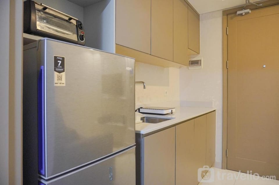 Modern Look and Warm 1BR at Gold Coast By Travelio Apartment in Jakarta
