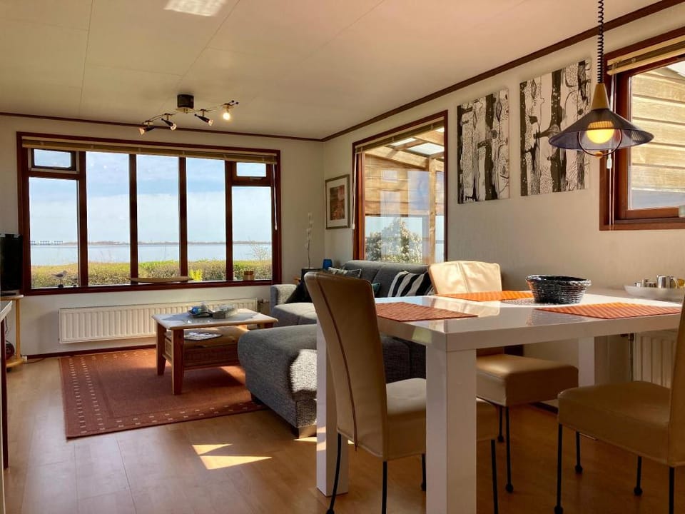 Waterfront holiday home sonnenschein 3 persons with sauna Chalet in Anjum