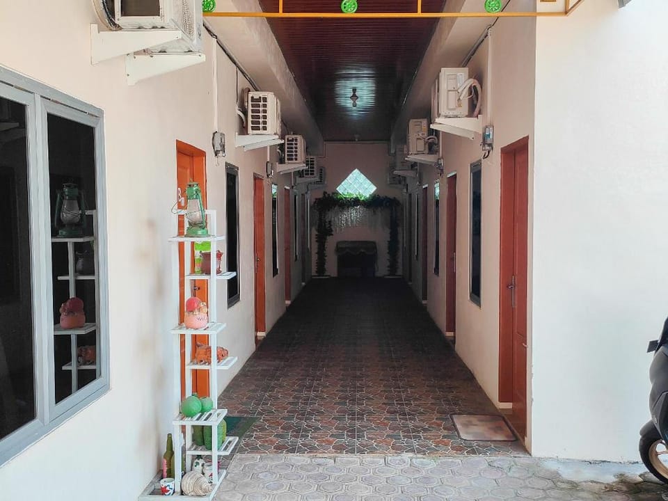 New Era Family Homestay Binjai Mitra RedDoorz Hotel in Indonesia