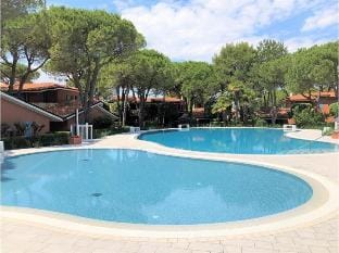 Big Apartment with Swimming Pool - Private Beach Place included by Beahost Apartment in Bibione