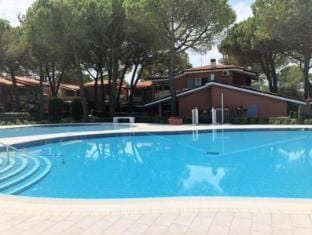Big Apartment with Swimming Pool - Private Beach Place included by Beahost Apartment in Bibione