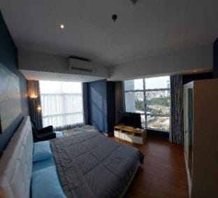 The Calmer @Grand Sungkono Lagoon connetingto Mall Apartment in Surabaya
