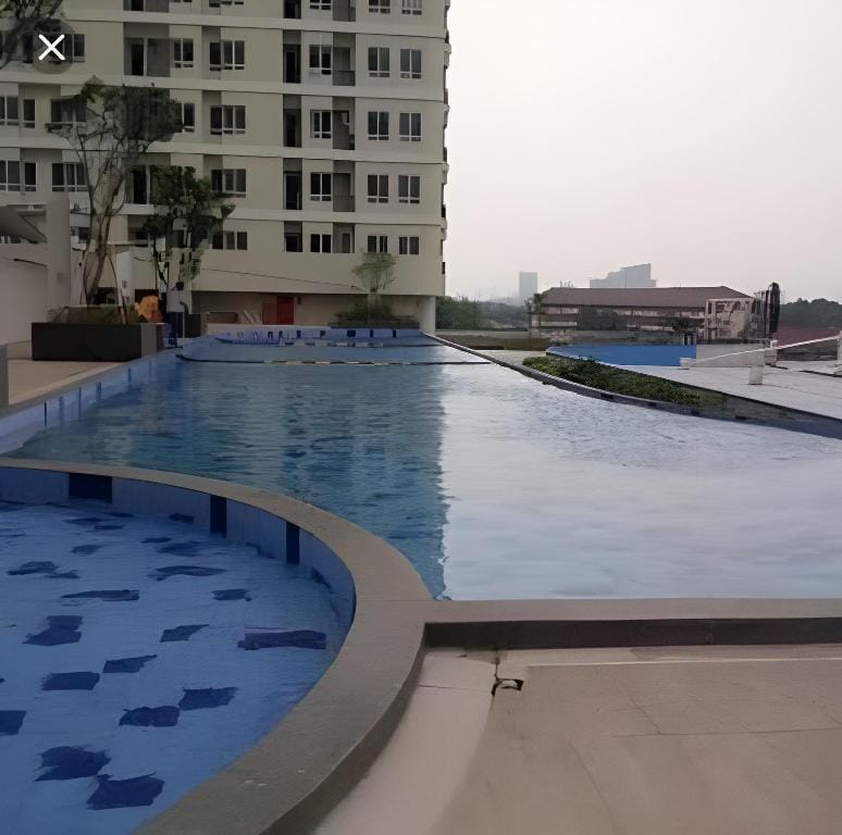Cozy place for family, suits for 4 with balcony ! Apartment in South Jakarta City
