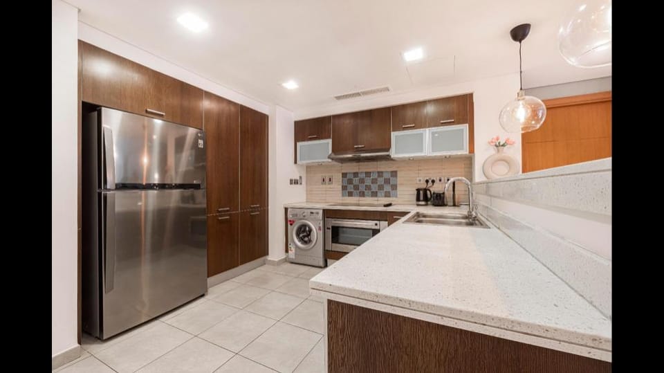 Large Terrace and Pool View | 2 Br. | Next to Mall Apartment in Dubai