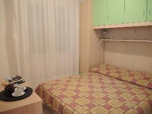 Two-Bedroom flat with balcony and private garden - By Beahost Rentals Apartment in Bibione