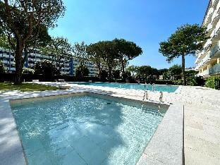 Nice and cozy apartment with pool by Beahost Rentals Apartment in Porto Santa Margherita