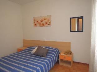 Villa with private garden and own barbeque - By Beahost Rentals Apartment in Bibione