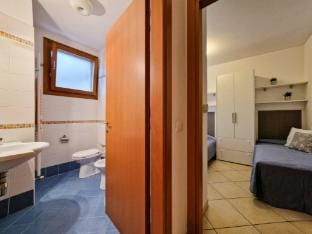 Two-roomed flat with garden and swimming pool - By Beahost Rentals Apartment in Bibione