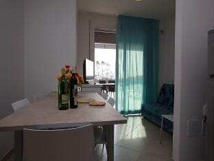 Wonderful attic with a large sea view terrace by Beahost Rentals Apartment in Rosolina Mare